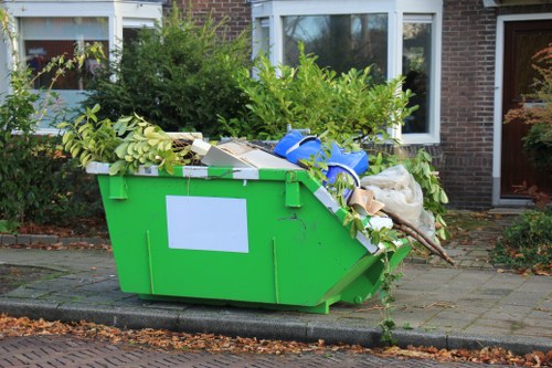 Workers segregating builders waste materials